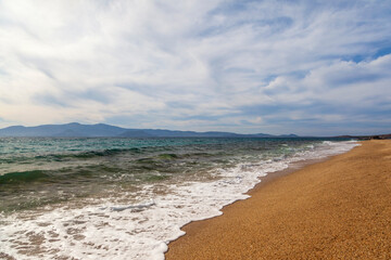 Sandy beach ofAgios Prokopios during a windy day, in Naxos island, Cyclades, Greece, Europe.