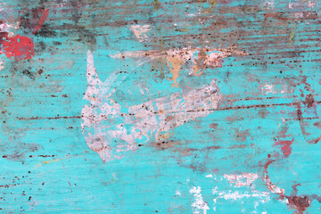Grunge background of turquoise. Old vintage wall covered in paint