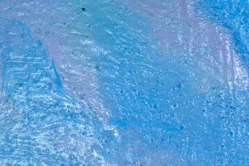 Texture of a canvas covered with paint close-up. Macro shooting of paint strokes