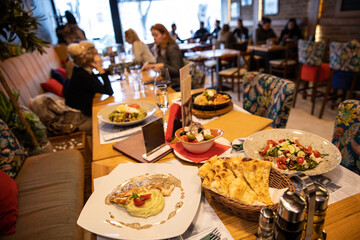 Food served on restaurant table
