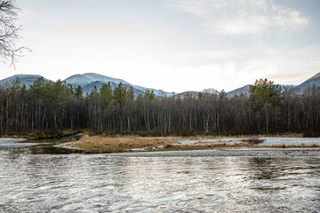 River with mountains in the background of rondane national park