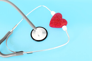 Red heart with stethoscope, heart health, health insurance concept, World heart day, world health day, world hypertension day