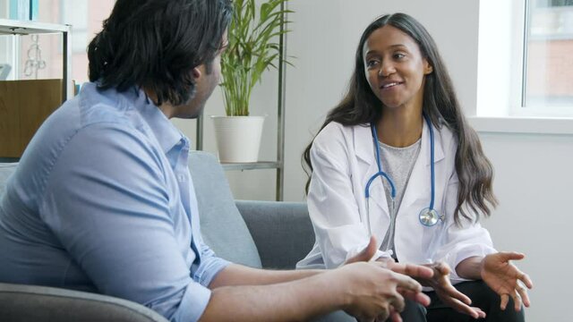 Approachable Doctor Talking with Patient