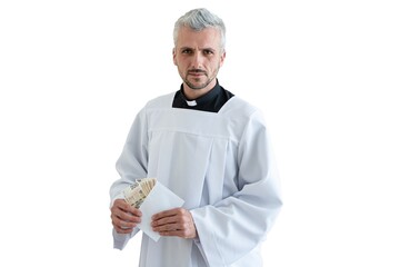Polish catholic priest holding Polish money zloty during pastoral visit in Poland. Isolated on...