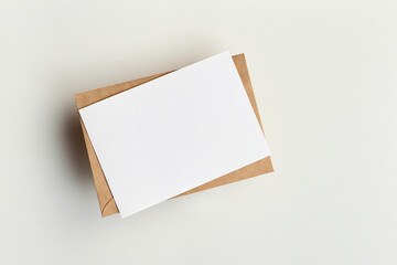 Greeting card mockup on white paper background