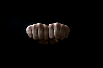 Man hands. Beautiful man's hands. Dark background. Male.  