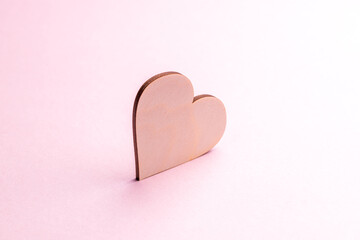 valentine day and romance concept. love symbol over pastel pink background. greeting card