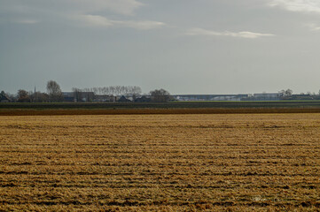 plowed field in the country in winter