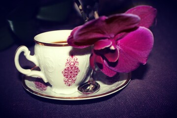 Cop of coffee in a white and pink cop