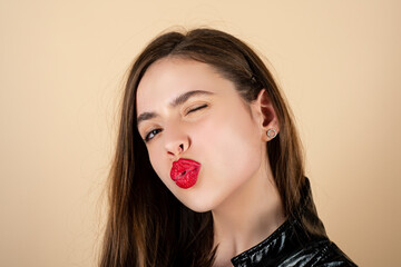 Red lips. Lipstick or Lipgloss. Sexy Lip. Kiss. Beauty model.
