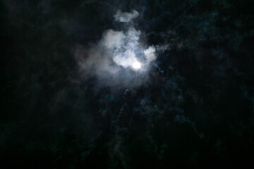 Naklejka na ściany i meble bright and thick smoke in the dark sky after the fireworks