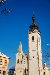 Three-nave Gothic basilica, Deanery church of the Nativity of the Blessed Virgin Mary, Architecture of medieval town, Clock tower and bell, Pisek, Southern Bohemia, Czech Republic