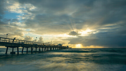 Fototapeta na wymiar Pompano Beach Pier Broward County Florida by stormy weatcher, USA