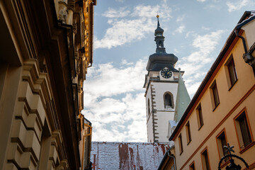 Three-nave Gothic basilica, Deanery church of the Nativity of the Blessed Virgin Mary, Architecture of medieval town, Clock tower and bell, Pisek, Southern Bohemia, Czech Republic