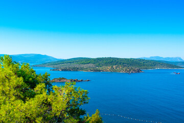 Beautiful Mediterranean landscape with Aegean sea and green hills