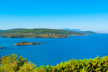 Fototapeta na wymiar Beautiful Mediterranean landscape with Aegean sea and green hills