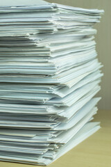 bundles bales of paper documents. stacks packs pile on the desk in the office