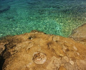 Rocky Srebrena beach on island Vis.
Vis, Croatia - June 28th 2020
