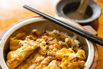 angle view fast food of scrambled eggs with rice and bowl of soup horizontal composition