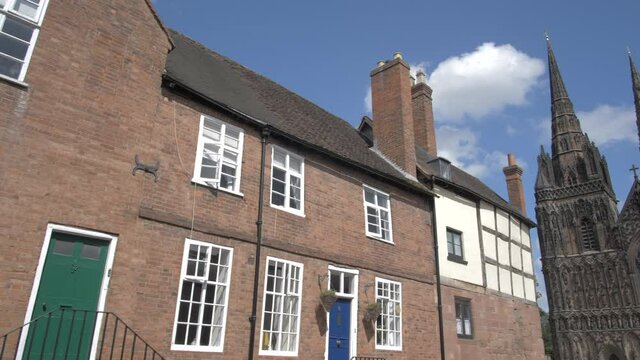 Nearby houses and Lichfield Cathedral on sunny day in summer, Lichfield, Staffordshire, England, United Kingdom, Europe