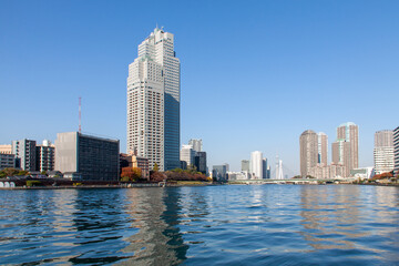 Fototapeta premium Tokyo Cityscape and the Sumida River against the Blue Sky