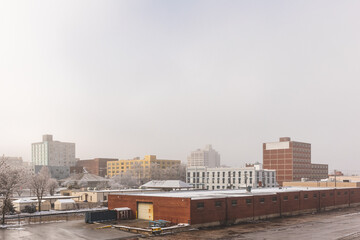 City skyline on a foggy snowy winter morning