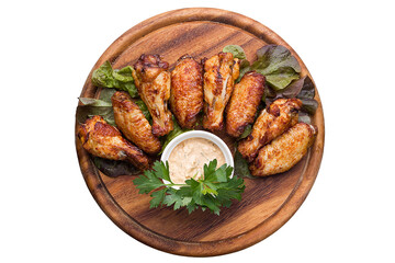 Chicken legs with rosemary on a wooden board. Restaurant service concept. Isolated.