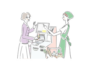 セルフレジの使い方を教えてもらうシニア女性
