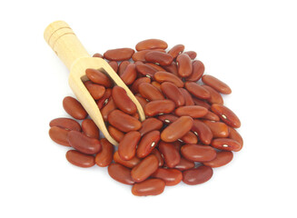 Red kidney beans with wooden scoop isolated on white background