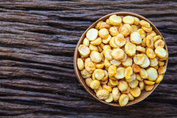 The beans seed on wooden  background,.