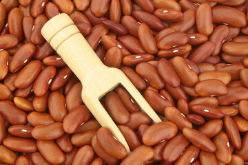 Red kidney beans with wooden scoop