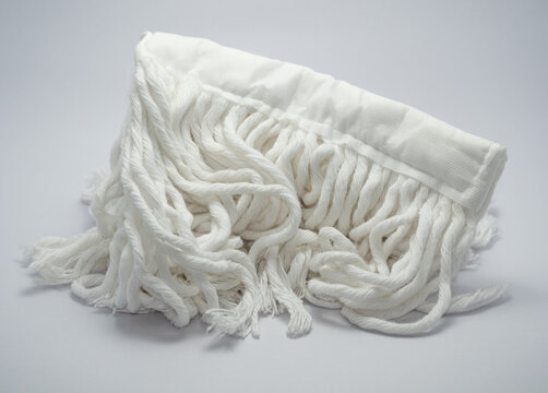 white mop head close up isolated on white background.