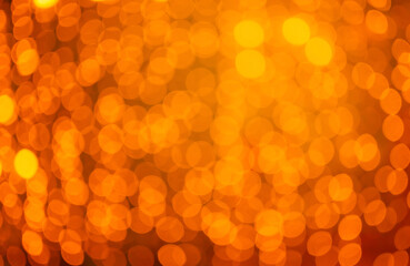 Abstract Golden bokeh background. Elegant abstract background with bokeh defocused golden lights....