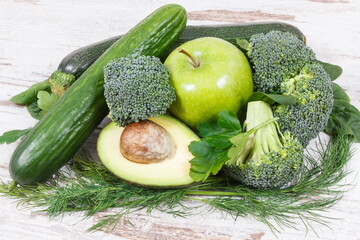 Green fruits and vegetables containing natural minerals, vitamins and fiber, healthy nutrition concept