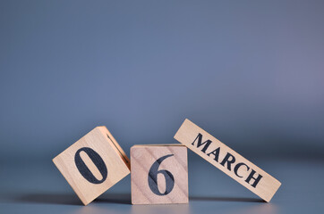 March 6, Cover in the evening time, Date Design with number cube for a background.