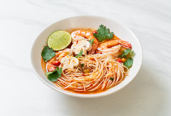 noodles with spicy soup and shrimps (Tom Yum Kung)