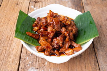 Sweet Pork Condiment (Thai name is muu waan) Thai streaky pork menu with coconut or palm sugar and black sauce