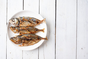 Deep fried mackerel with fish sauce, Traditional Thai food.