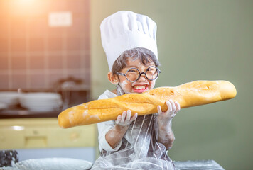 Boy playing naughty in the kitchen