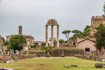 Fototapeta na wymiar The Roman Forum (Italian: Foro Romano), is a rectangular forum surrounded by the ruins of several important ancient government buildings at the center of the city of Rome.