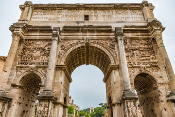 Fototapeta na wymiar Arco di Settimio Severo at the Roman Forum in Rome, Italy