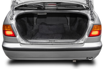 Clean, open empty trunk in the silver car sedan  on white isolated  background