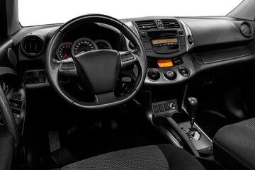 Fototapeta na wymiar Luxurious car interior - steering wheel, shift lever and dashboard on white isolated background.