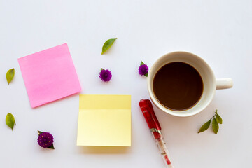 hot coffee with post it note for business work arrangement flat lay style on background white