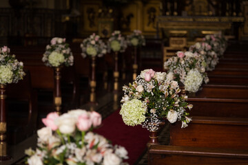 Detail view of wedding flower bouquet decoration in a church
