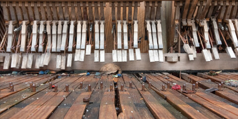 detail close up of old broken piano parts