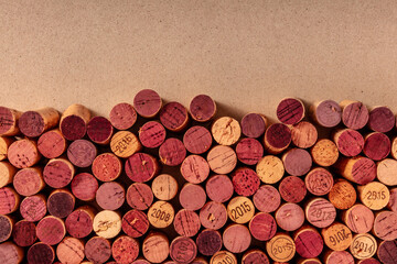 Wine corks background, a design template for a restaurant menu or winery brochure, shot from the top with copy space