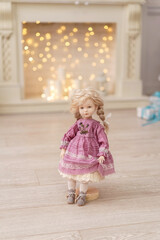 designer interior doll with a human face, made by hand from textiles, in retro style