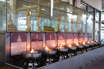 Statue of Buddha in each week day position.