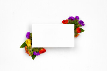 Blank paper with copy space and flower buds